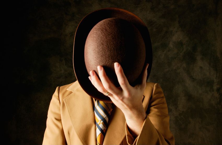 LEPH - Telltale Signs of a Real Estate Bogus Buyer - Man Hiding Face with Hat